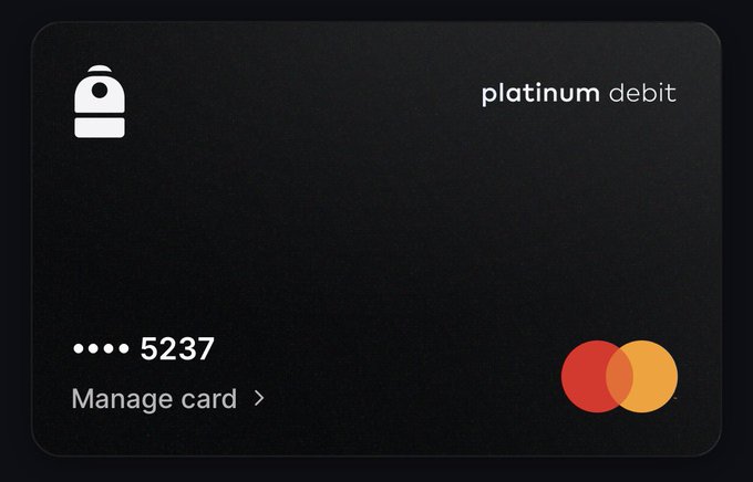 A black metal prepaid debit card branded with a padlock icon and "platinum debit" text, showing a Mastercard logo and a masked card number ending in 5237 with a "Manage card" link.