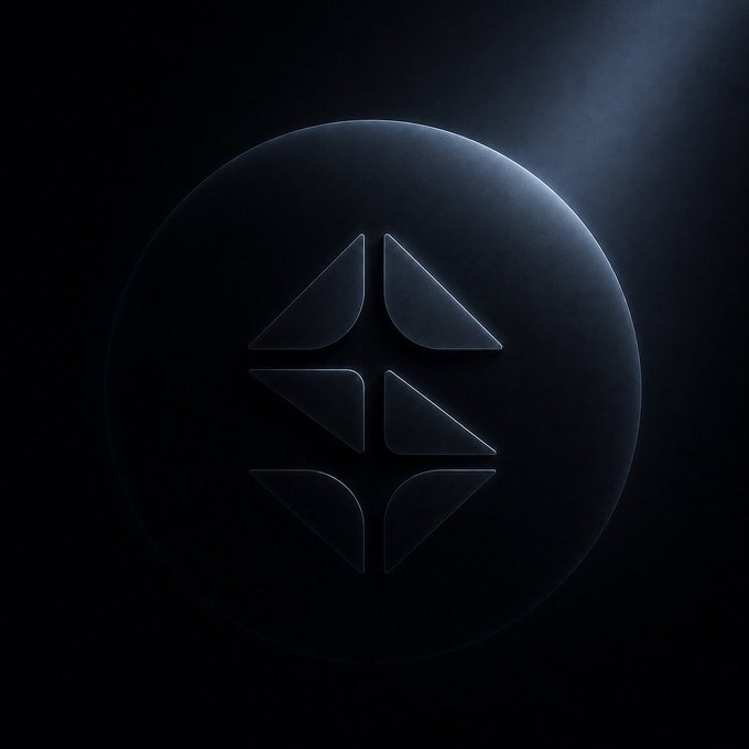 A dark, minimalist 3D render of the Lisk (LSK) cryptocurrency logo, featuring geometric shapes forming a stylized symbol on a circular black disc.