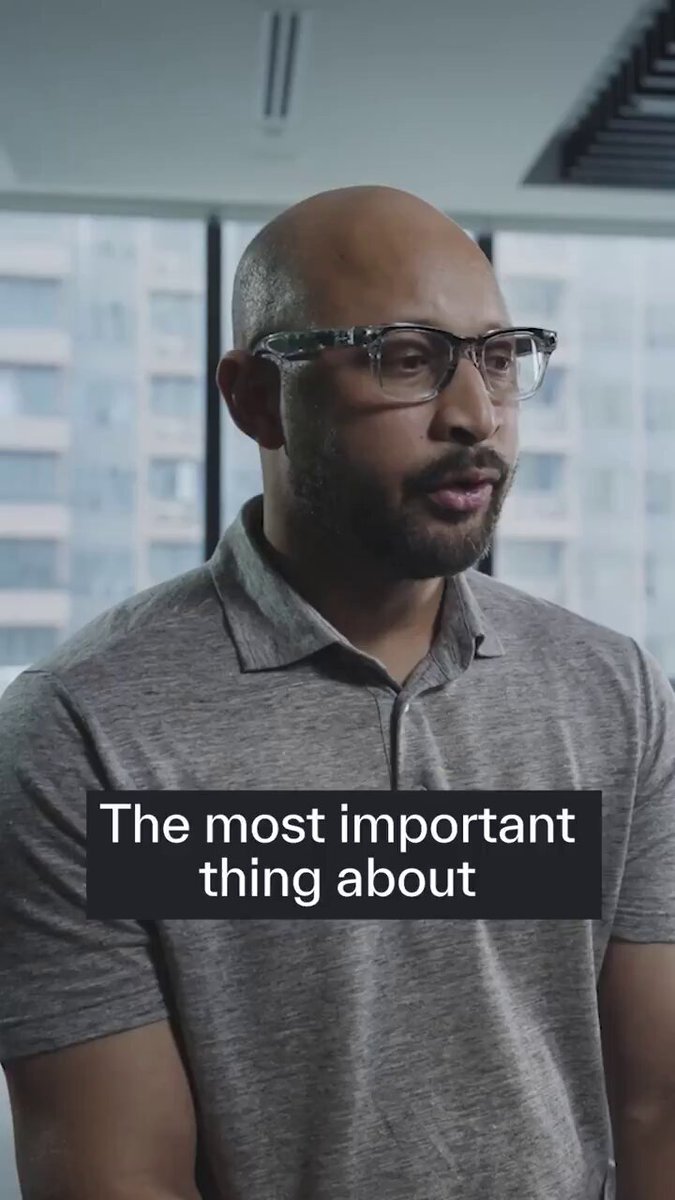 The image features a man wearing glasses and a gray shirt with the text "THE MOST IMPORTANT THING ABOUT" written above his head. The man appears to be looking off into the distance, possibly contemplating something important or interesting that he has just read in the caption of the image.