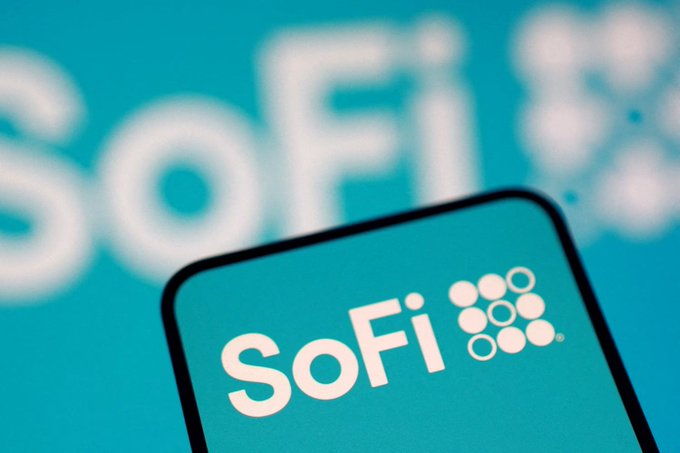 The image shows a blue phone screen displaying the SoFi logo, which stands out against the blue background. In addition to the phone's content, there are also words related to cryptocurrency visible, suggesting that the phone might have features for interacting with or viewing information about cryptocurrency operations like SoFi. This could include news updates, market analysis, or trading platforms on platforms such as Ethereum and Solana.