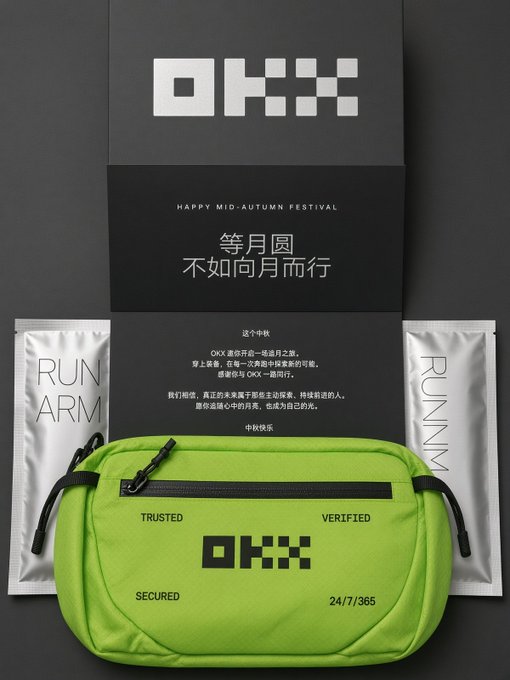 The image displays an OKX Mid-Autumn Festival gift package featuring a neon green "TRUSTED VERIFIED SECURED 24/7/365" crossbody bag alongside two silver "RUN ARM/RUNNM" packets and a black card reading "HAPPY MID-AUTUMN FESTIVAL 等月圆 不如向月而行" — showcasing the brand's premium promotional merchandise that the user received and praised in their post.