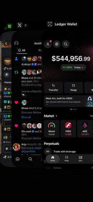 The image shows a mobile phone displaying a crypto wallet app with a Ledger Wallet balance of $544,956.99, along with various notifications and market data including Mood (70), FIRO (-5.26%), and AKE (01:37:1). 

The caption accompanying the post appears to be a giveaway scam, and the image of a high-value crypto wallet balance ($544,956.99) is likely being used as fake "proof" to make the $30,000 USDC giveaway offer seem legitimate and convince people to share their wallet information on the linked Discord.