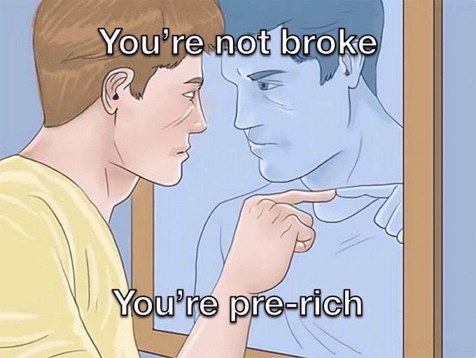 A meme illustration showing a young man pointing at his reflection in a mirror, with text reading 'You're not broke' and 'You're pre-rich.'