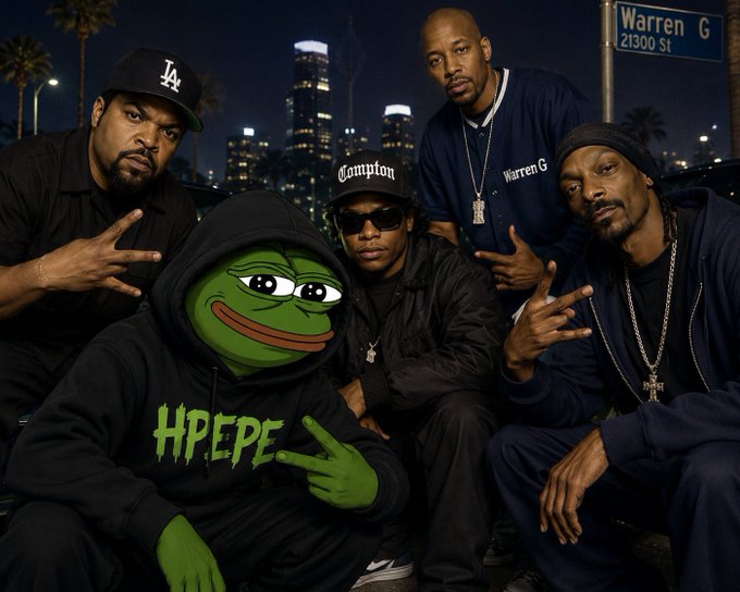 A group photo of five men, including one wearing a Pepe hoodie, posing together at night with a city skyline behind them; a street sign reads 'Warren G 21300 St'.