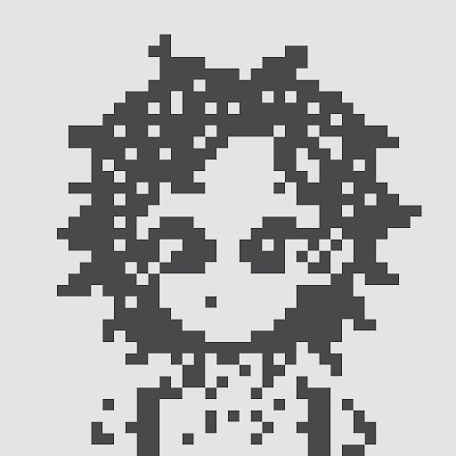 A low-resolution, pixelated grayscale image that appears to be a heavily obscured or censored face.