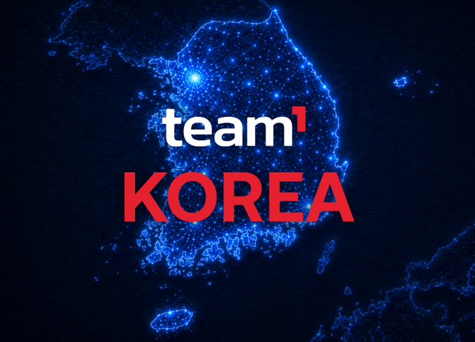 A digital map of Korea glows in blue with the text 'team¹' in white and 'KOREA' in red overlaid on the center.