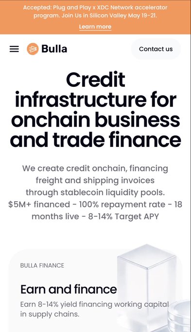 The image shows the Bulla Finance website, announcing their acceptance into the Plug and Play x XDC Network accelerator program (May 19-21), highlighting their credit infrastructure for onchain business and trade finance with $5M+ financed, 100% repayment rate, and 8-14% target APY. This directly supports the post's excitement about Bulla joining the XDC Network ecosystem, emphasizing their role in bringing trade finance—including invoices, freight, shipping, and working capital—onchain.