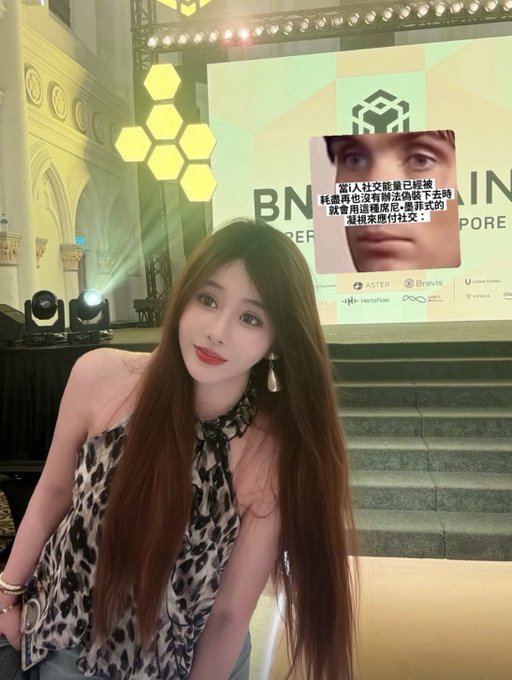 A young woman with long hair poses at what appears to be a Binance-hosted event, with the "BN" branding and partner logos (Aster, Brevis, Luméx, etc.) visible on the stage backdrop. An inset text overlay in Chinese references a wealthy man allegedly being detained under the Serious Crimes Ordinance, with offers of large sums for photos and social media promotion. The caption reflects on her attending the Token2049 Binance event at her heaviest weight yet (104 jin/52kg), noting it's her second Binance appearance this year after a panel appearance in Hong Kong when she weighed 96 jin.