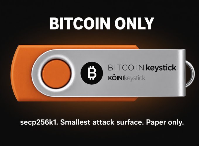 A promotional image for a 'BITCOIN ONLY' hardware wallet by KoinIkeistick, featuring an orange and silver USB-style device with the Bitcoin logo, advertising 'secp256k1. Smallest attack surface. Paper only.'