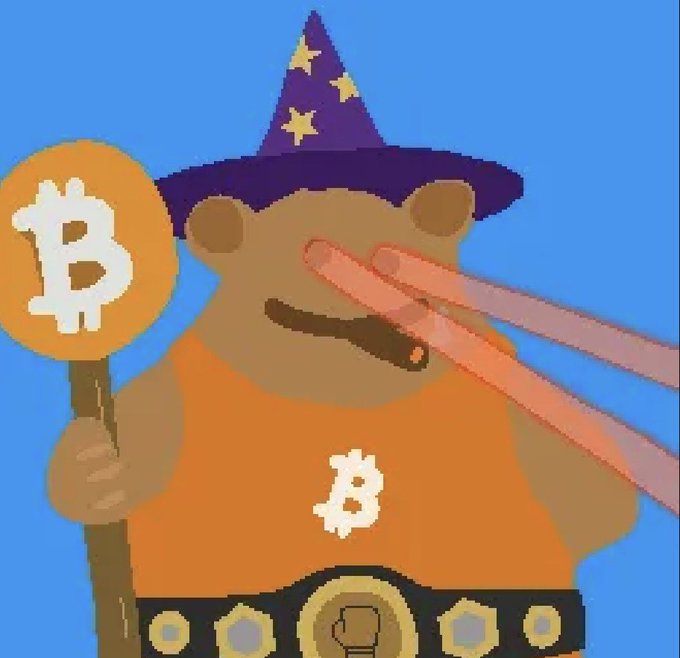 The image features a cartoon bear wearing an orange shirt with "B" written on it, holding a sign that says "BITCOIN" above his head. The bear has two glowing red eyes and a hat with a purple top hat on it. The background of the image is blue, and there are three rays coming out from behind the bear's head.