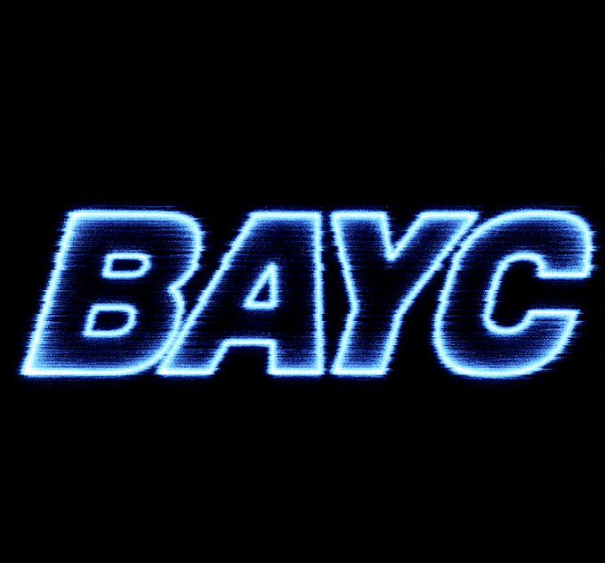 The image shows the "BAYC" (Bored Ape Yacht Club) logo rendered in a glowing blue neon-style outline against a black background. This visual directly connects to the post, as seeing the iconic BAYC branding reinforces the enthusiastic "I see BAYC, I say YES" sentiment—evoking the enthusiasm of an NFT collector recognizing the recognizable monkey club logo.