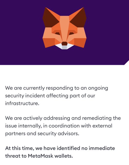 A MetaMask security notice featuring the fox logo on a purple background, stating they are responding to an ongoing security incident but currently identify no immediate threat to MetaMask wallets.