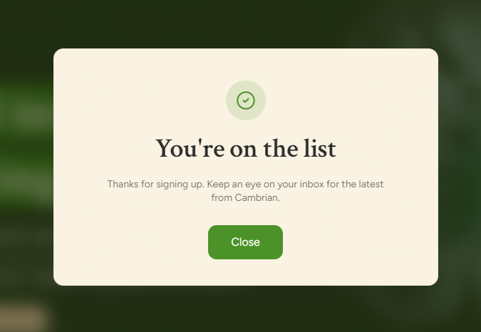 A success confirmation popup from Cambrian showing "You're on the list" with the message "Thanks for signing up. Keep an eye on your inbox for the latest from Cambrian," indicating the user has successfully joined Cambrian Network's mailing list—likely related to the post highlighting Cambrian as an AI Agent + DeFi project that raised $11.9M from investors like A16z CSX and Polychain Capital.