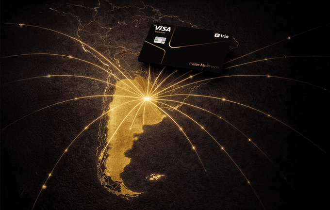 The image features a black Visa card placed next to a map of South America with a yellow sunburst design around the continent. The card has a Visa logo on its front, indicating that it's a credit or debit card issued by Visa. The map shows the countries of South America in different colors, and there are rays emanating from the center of the map, creating a visually striking effect.

The post seems to be promoting the idea of using a credit card for travel expenses, as indicated by the presence of the South American map with the sunburst design. The image also contains text that reads "Happy day @useTria is being built not because we need another crypto wallet", which could be an advertisement or promotional message related to the use of credit cards for travel purposes.