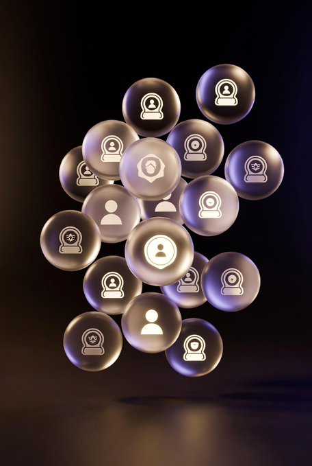 A cluster of floating translucent spheres with purple and gold hues, each displaying a user profile icon.