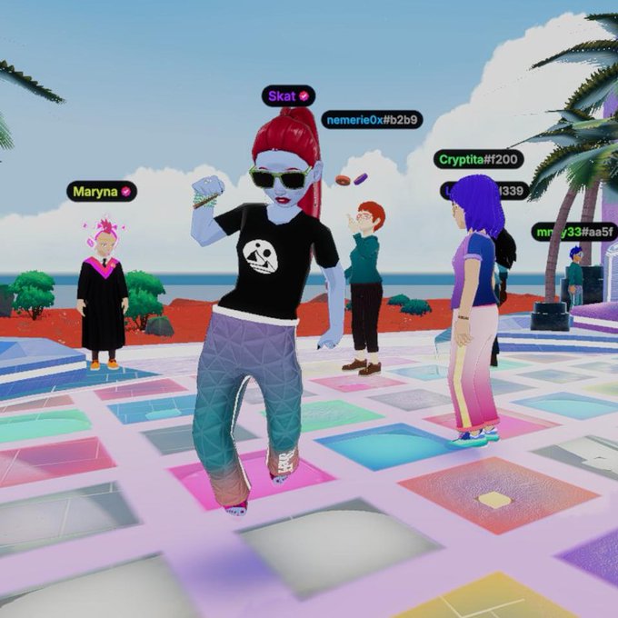 A screenshot from a virtual 3D environment showing avatars with usernames like '5kat', 'nemerie0xb2b9', 'Maryna', and 'Cryptita#200' standing on a colorful checkered platform.