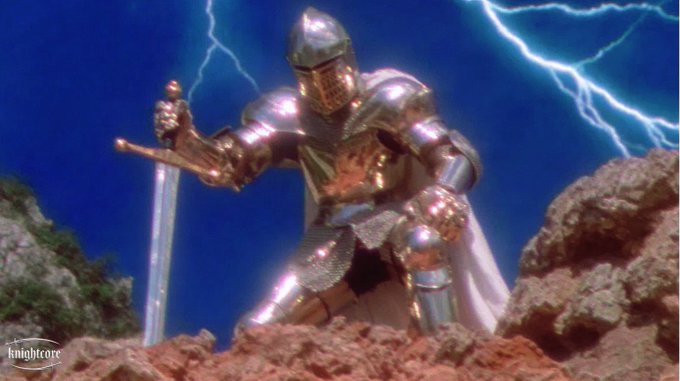 A knight in shining silver armor grips a sword while standing on rocky terrain with lightning bolts striking in the dark blue sky behind him.