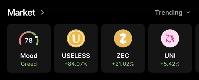 A cryptocurrency market screen showing the 'Mood' index at 78 (Greed), with USELESS up 84.07%, ZEC up 21.02%, and UNI up 5.42%.