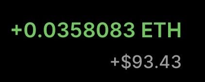 A digital display shows a cryptocurrency balance of +0.0358083 ETH in green text, equivalent to +$93.43 in gray text against a black background.