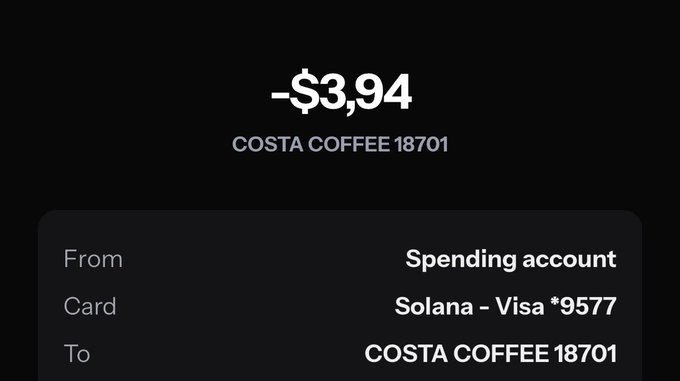 A dark-themed transaction receipt showing a charge of -$3.94 from a Solana Visa card spending account to COSTA COFFEE 18701.