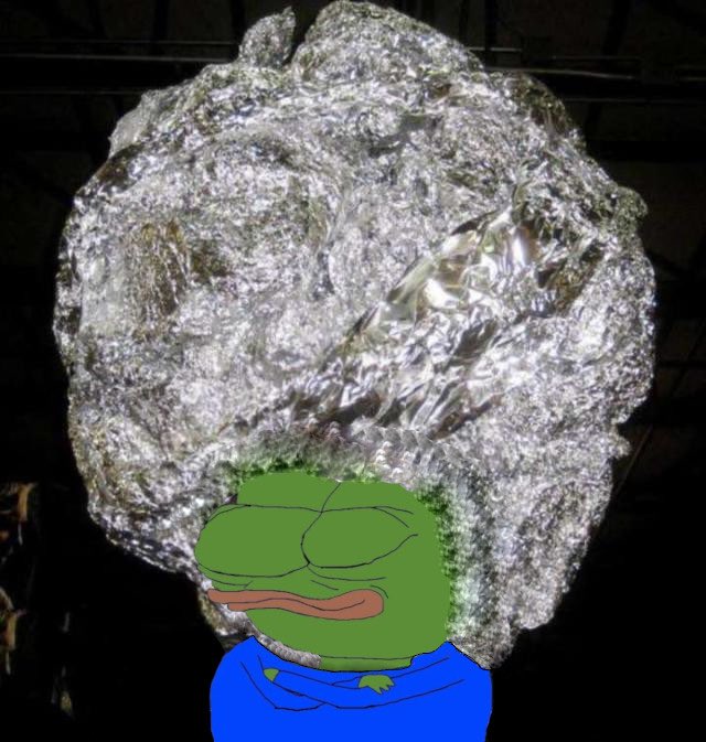 A meme image featuring the 'Uncomfortable Pepe' frog character with a frowning face, wearing a blue shirt, with a large shiny metallic rock or mineral specimen photoshopped as its hair.