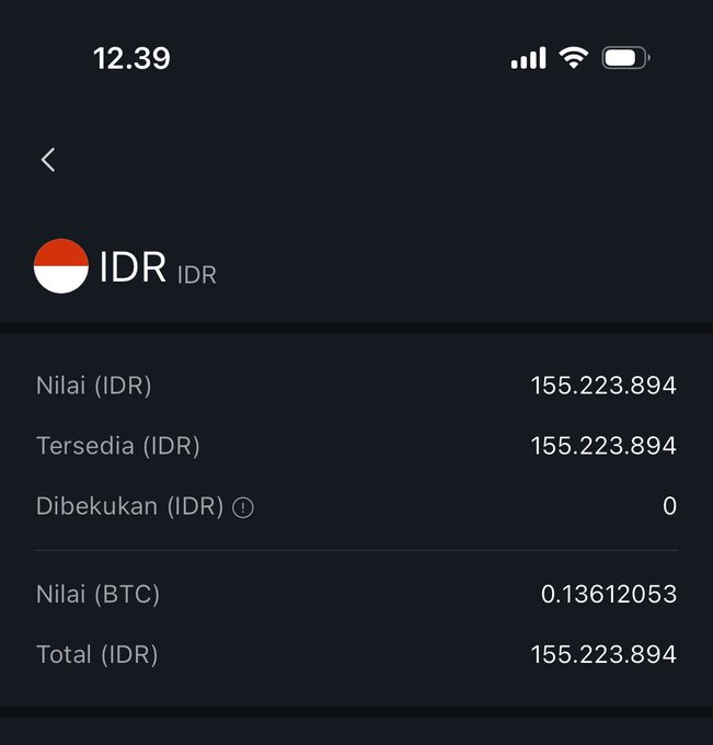 The image shows a black phone screen displaying information about an account balance of 155 million. The text on the screen reads "Just deposited 155 million to buy @Polymarket Wanna bet on all the way to the final—do you think it's okay, bro, to go all in on @Polymarket Wanna bet on all the way to the final?". This information is related to a betting app where users can deposit money and potentially win big. The image also includes a Bitcoin symbol at the bottom left corner of the screen.