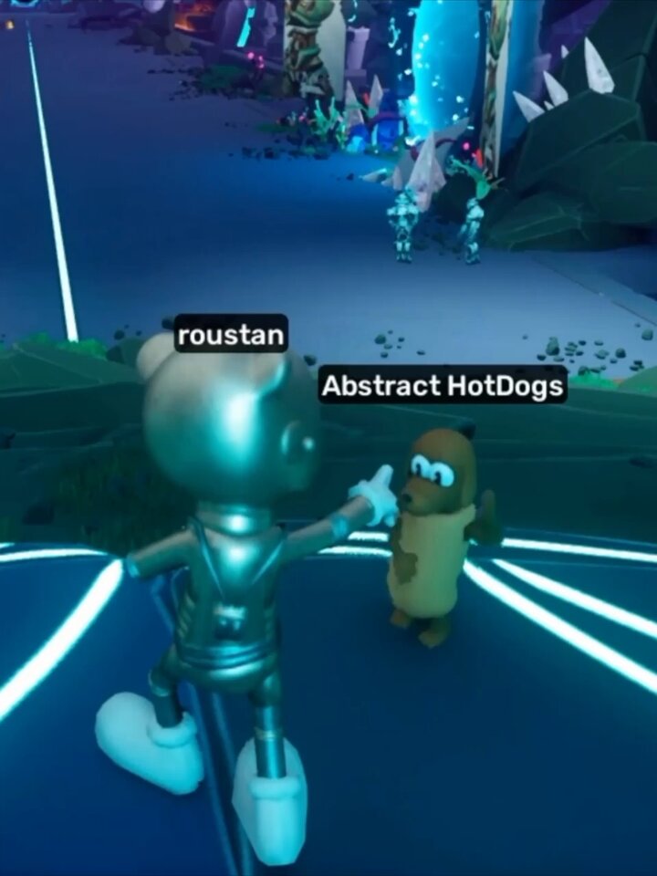 The image features a cartoon scene with two characters - a robot dog and an anthropomorphic hot dog. The robot dog, wearing a silver suit, stands next to the hot dog who has a brown outfit. They are both facing each other on a blue surface, possibly in a park or a similar setting. The caption of the post reads: "Dance Battling @akidcalledbeast @clonexcreators and more vs Hot Dogs and Apes in the @OthersideMeta!".