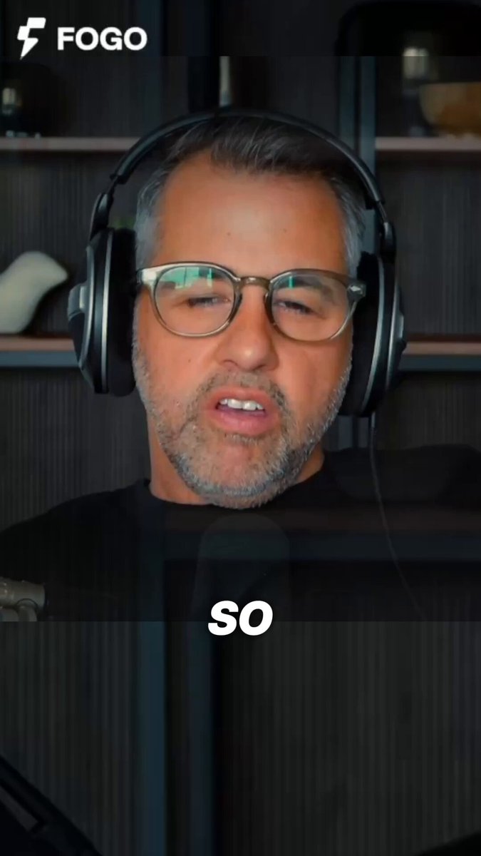 The image shows a man wearing headphones with glasses sitting behind a desk or table. The caption reads "So" which seems to be a part of a larger message, but I can't see the full context. It appears that someone has posted this image on social media, possibly as a joke or for some other humorous purpose.