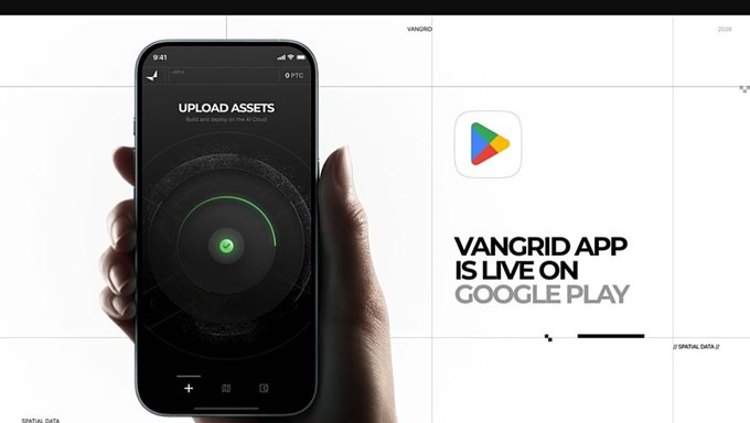 A promotional graphic announcing 'VANGRID APP IS LIVE ON GOOGLE PLAY' showing a hand holding a smartphone displaying an 'UPLOAD ASSETS' screen with a circular green interface.