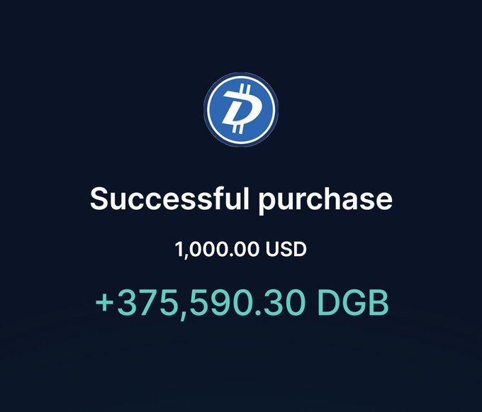 The image shows a success message for a Bitcoin transaction, with a blue circle containing a Bitcoin symbol at its center. Below the circle, there are two lines of text that read "Successful purchase" and "$DGB Appreciate the opportunity." The background is black, which contrasts with the white text on the screen.