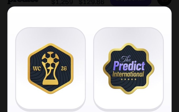 Two digital badges or icons are displayed: a hexagonal gold and navy 'WC 26' trophy emblem and a star-shaped 'The Predict International' logo.
