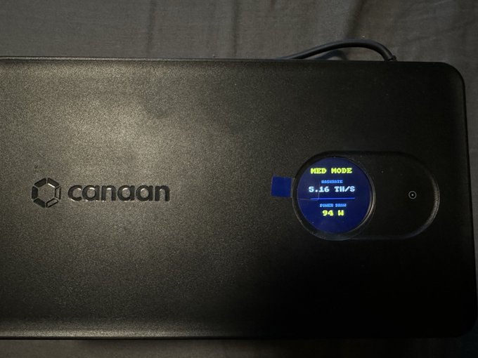 The image shows an electronic device with a screen displaying the time of 5:16 PM, along with some text that reads "Canavan" and "HD Haze". The device appears to be a laptop or computer monitor, possibly connected to a power source. The screen is lit up, indicating it's turned on and ready for use.