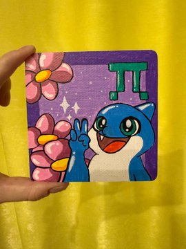 A hand holding a small painting of the Pokémon Munchlax making a peace sign, with flowers and the Pi symbol on a purple background.