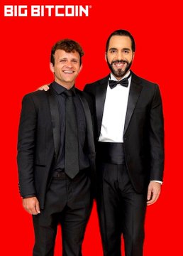 Two men in black tuxedos stand against a bright red background with the text 'BIG BITCOIN®' in the upper left corner, one of them wearing a bow tie.