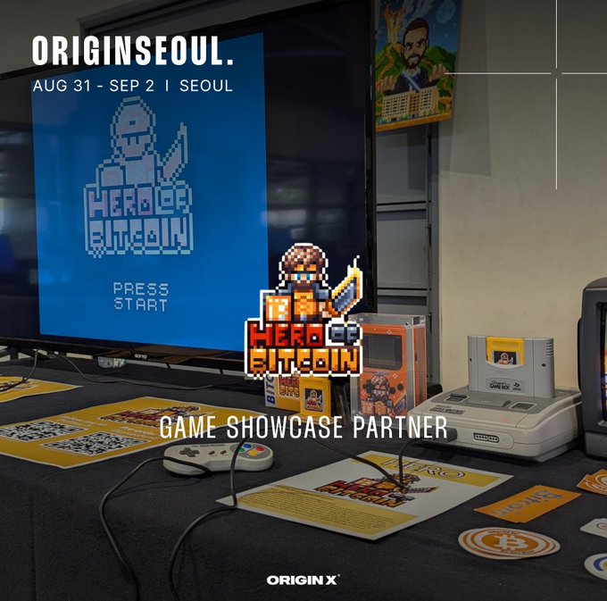 A promotional graphic for "Hero of Bitcoin" featuring a retro gaming setup with a Super Nintendo console, game cartridge, and pixelated character display, announcing its showcase as a "Game Showcase Partner" at ORIGINSEOUL from Aug 31 - Sep 2 in Seoul.