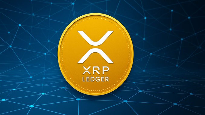 A gold coin featuring the XRP logo and the text 'XRP LEDGER' is displayed against a dark blue background with a network of connected nodes.