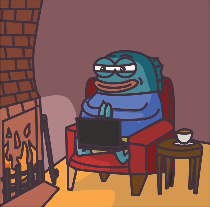 A cartoon teal character wearing glasses and a blue shirt sits in a red armchair using a laptop next to a fireplace.