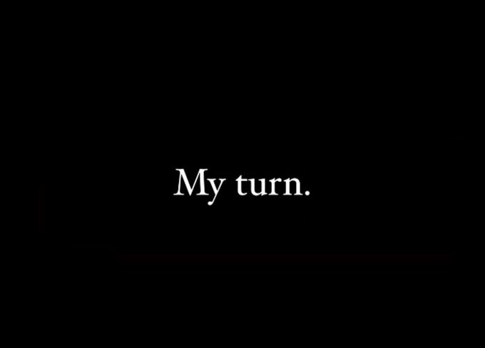A minimalist black screen with white serif text in the center reading 'My turn.'