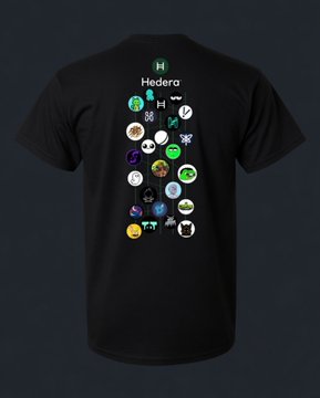 A black t-shirt featuring the Hedera logo and a colorful array of cryptocurrency token designs on the back. The displayed tokens likely correspond to the HBAR NFT collection referenced in the post, showcasing the variety of digital assets available on the Hedera network.