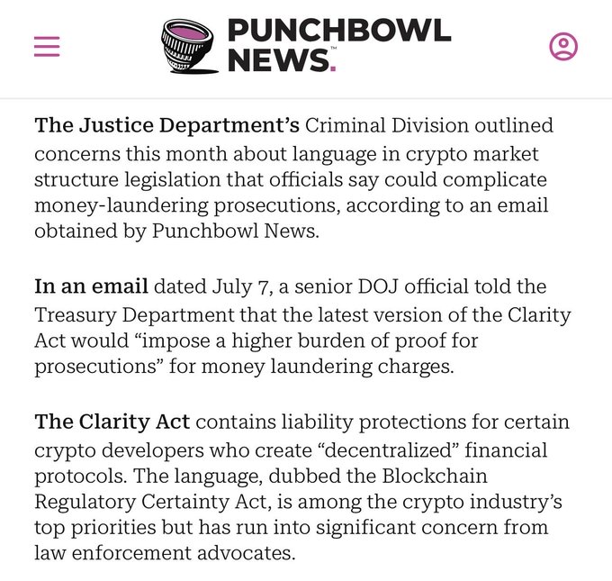 The image shows a Punchbowl News article reporting that the Justice Department's Criminal Division expressed concerns in a July 7 email about how the Clarity Act's language, specifically the Blockchain Regulatory Certainty Act provisions protecting decentralized crypto developers, could complicate money-laundering prosecutions by imposing a "higher burden of proof" on the DOJ.
