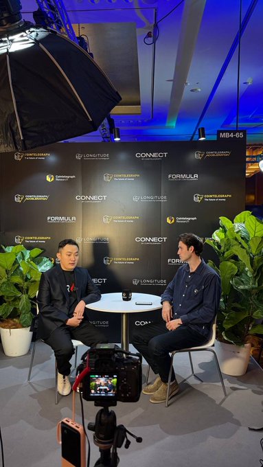 Justin Sun of TRON sits across from Cointelegraph's Ciaran Lyons at a backdrop featuring logos for Cointelegraph, Longitude, Formulr, and Connect, discussing bipartisan crypto regulation.