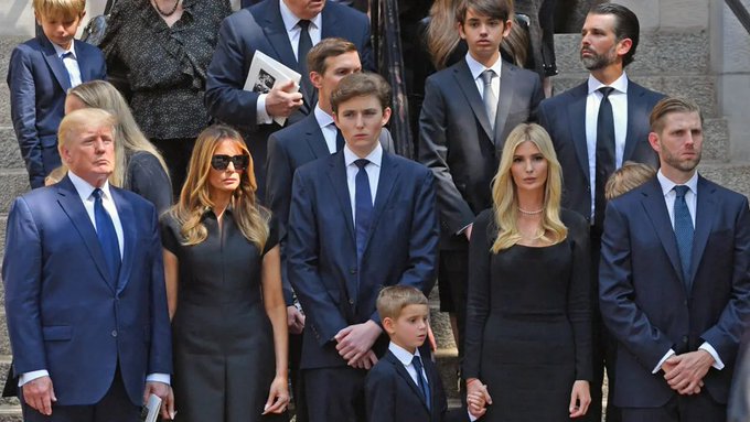 The image shows a group of people, including members of the Trump family, standing together for a photo. The group consists of both men and women dressed in suits and ties, with some individuals wearing sunglasses. The background includes stairs leading up to an event or location where they are gathered. The post suggests that the Trump family has been involved in crypto ventures, which have generated significant wealth over time. However, it also mentions that investors have lost a substantial amount of money due to these ventures.
