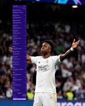 Vinícius Júnior, wearing a Real Madrid kit with the "Emirates Fly Better" sponsor, celebrates with arms outstretched under the stadium lights—a fitting visual for a sports bettor's massive 3,045x parlay win on BiggerZ, where $25 cashed out for $76,142.