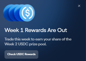 The image features an email notification from the @Ondo Perps app for Week 1 rewards. The email reads, "Week 1 reward distribution has been completed today. Check your account activity if you haven' t or the rewards page." The email states that a 25% increase in week 2 USDC prize pool is available. It also mentions that trade RWAs (rewards-based trading) on @Ondo Perps app should be considered to receive this reward pool.