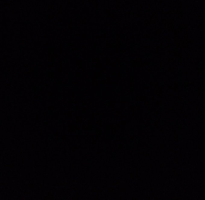 A completely blank black image with no visible content.