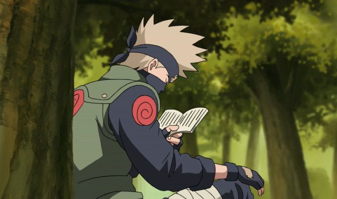 An anime scene showing a character with spiky blonde hair, a headband, and a green flak jacket with red swirl emblems, sitting against a tree and reading a small book in a forest setting.