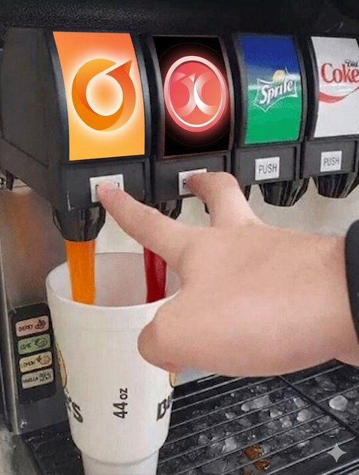 A hand presses two soda dispenser buttons simultaneously, filling a 44 oz cup with both an orange and a red beverage from a multi-flavor fountain machine.