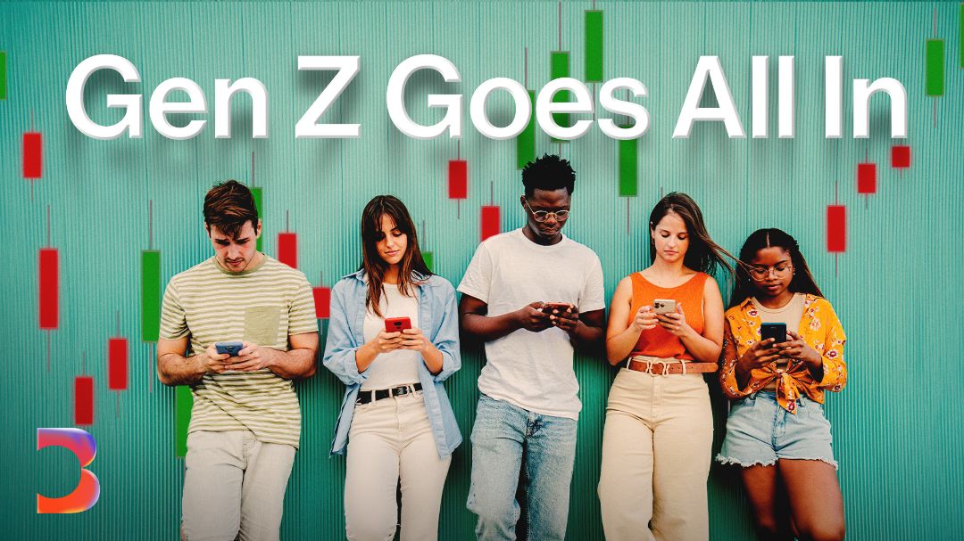 Five young people stand in a row, all absorbed in their smartphones, beneath the bold headline "Gen Z Goes All In" set against a green background featuring red and green candlestick chart patterns. The image visually reinforces the article's theme of a generation channeling its financial ambitions into high-risk, fast-paced investments like meme stocks, options, and crypto.