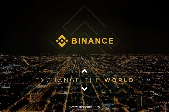 A nighttime aerial view of a city skyline serves as the backdrop for the Binance logo and the tagline "EXCHANGE THE WORLD," with the website "www.binance.com" displayed at the bottom, tying the global reach of the exchange to its quarterly BNB coin burn milestone.