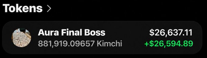 A token dashboard screenshot for “Aura Final Boss” shows a balance of 881,919.09657 Kimchi valued at $26,637.11, with a green +$26,594.89 gain. It appears to be a prize or winnings claim associated with the accompanying Solana giveaway post.